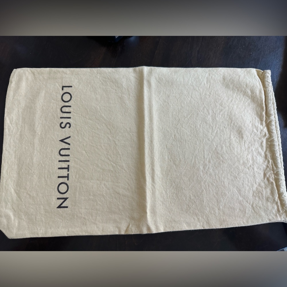 Authentic Louis Vuitton cotton dust bag.